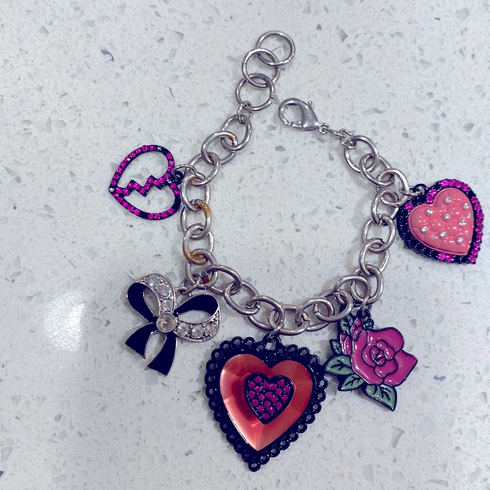 Betsy Johnson? Silver tone pink and black charm bracelet.